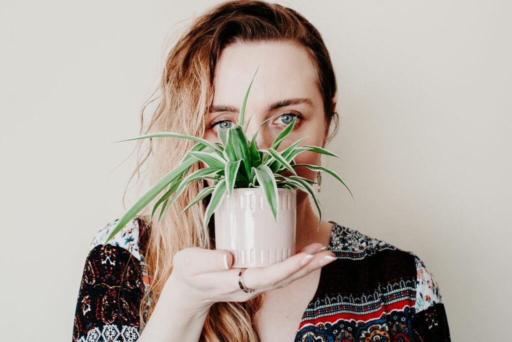 Woman Holding a Houseplant