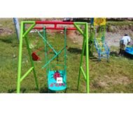 Colorful Kids Swing 1-Seater with a sturdy frame and a fun ladybug design, set in an outdoor play area.