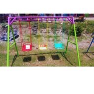 Kids Swing 3-Seater with colorful red, yellow, and blue seats and a sturdy steel frame, set in an outdoor play area.