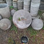 Large concrete spheres for land scaping.