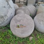 Small concrete spheres for landscaping.