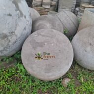 Small concrete spheres for landscaping.